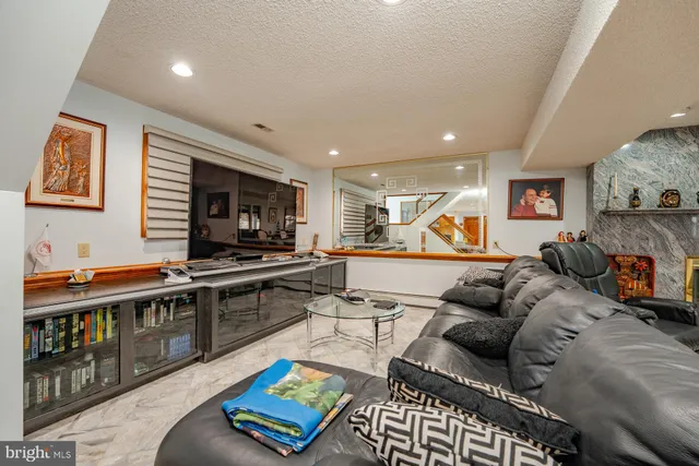 a view of a swimming pool with a yard