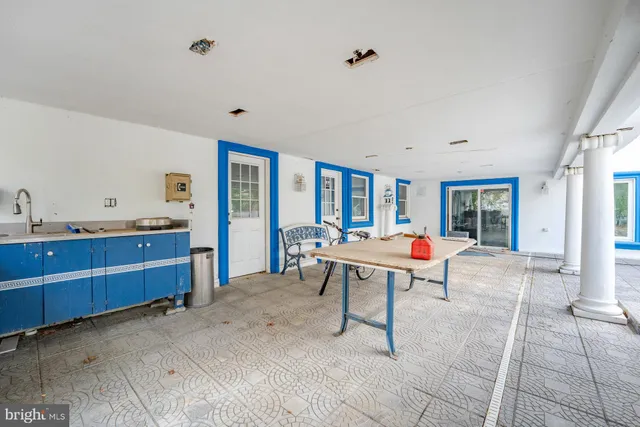 a room with furniture and a rug