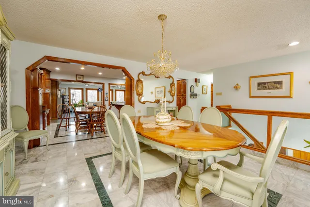 a spacious bedroom with a bed and a walk in closet