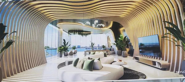 a living room with a bed and a table