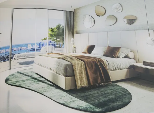 an aerial view of a swimming pool a yard and outdoor seating