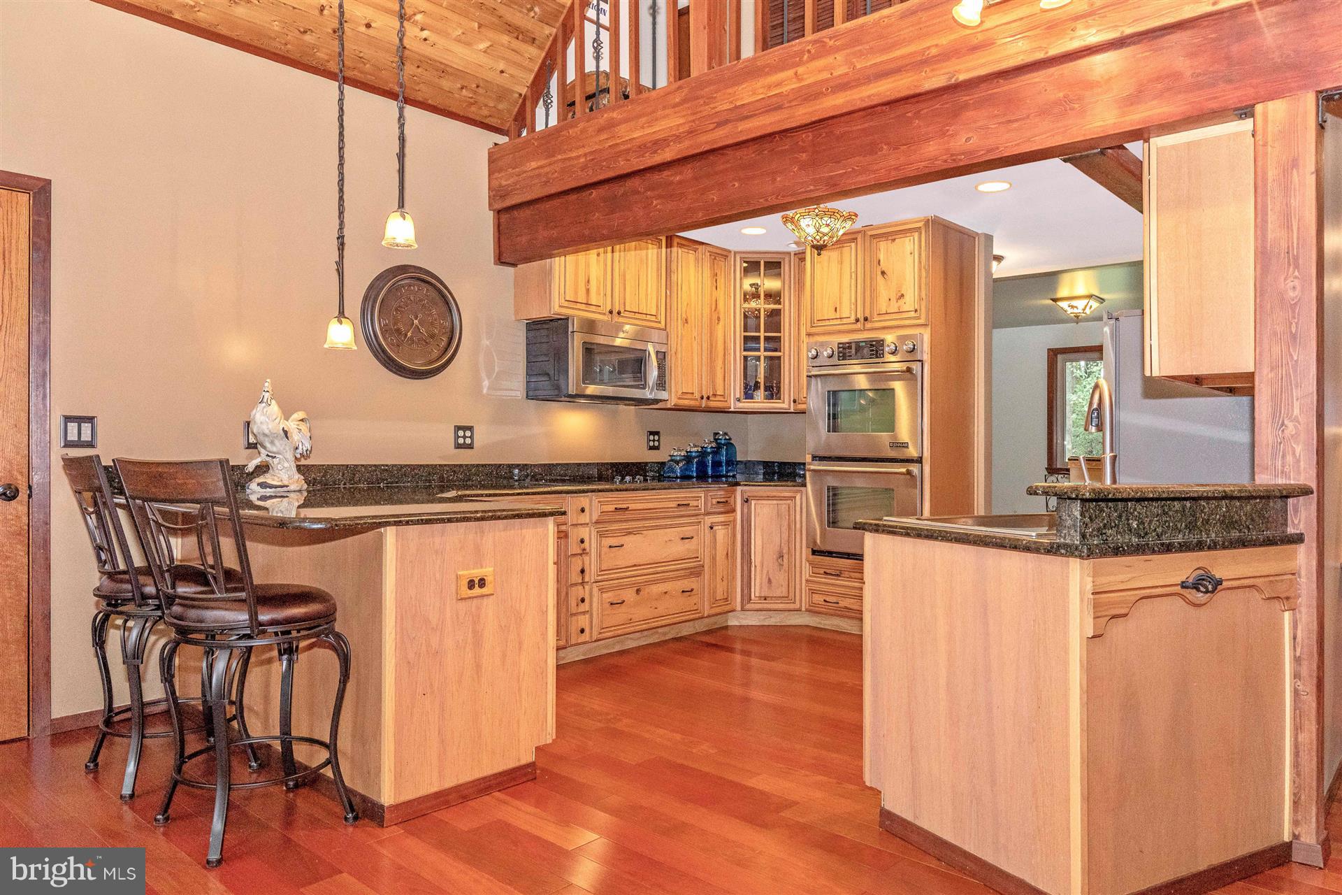 914 Trevanion Road Union Bridge, MD 21791 - Photo 27 of 54 Granite counters and breakfast bar.