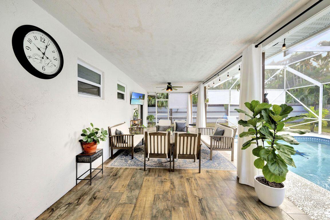 1104 Northwest 12th Terrace Stuart, FL 34994 - Photo 22 of 32 a view of entryway with wooden floor
