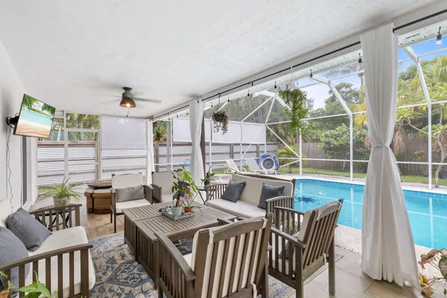 a view of an outdoor dining space with furniture