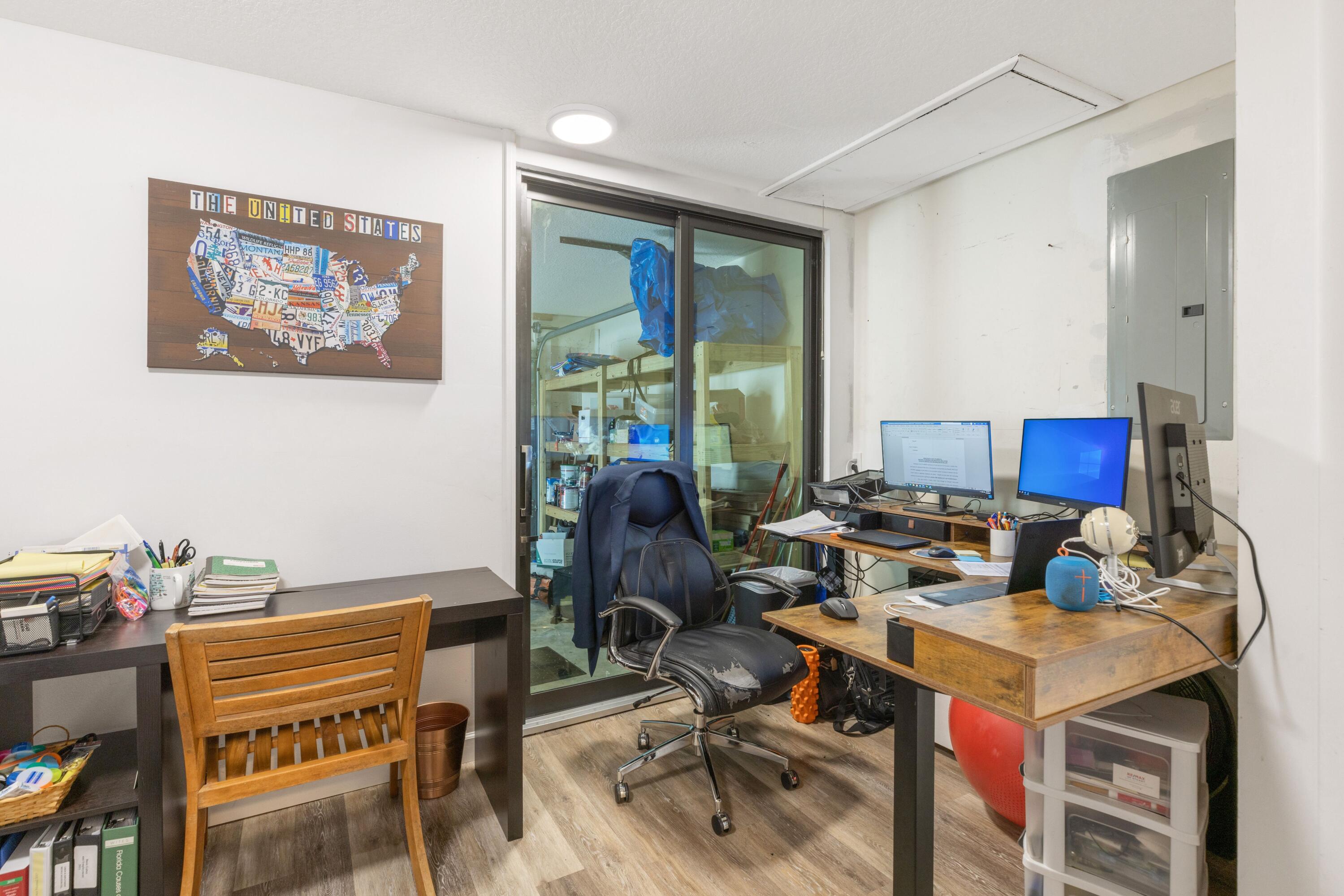 1104 Northwest 12th Terrace Stuart, FL 34994 - Photo 28 of 32 a view of a workspace with furniture