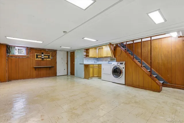 a view of a storage & utility room with washer and dryer
