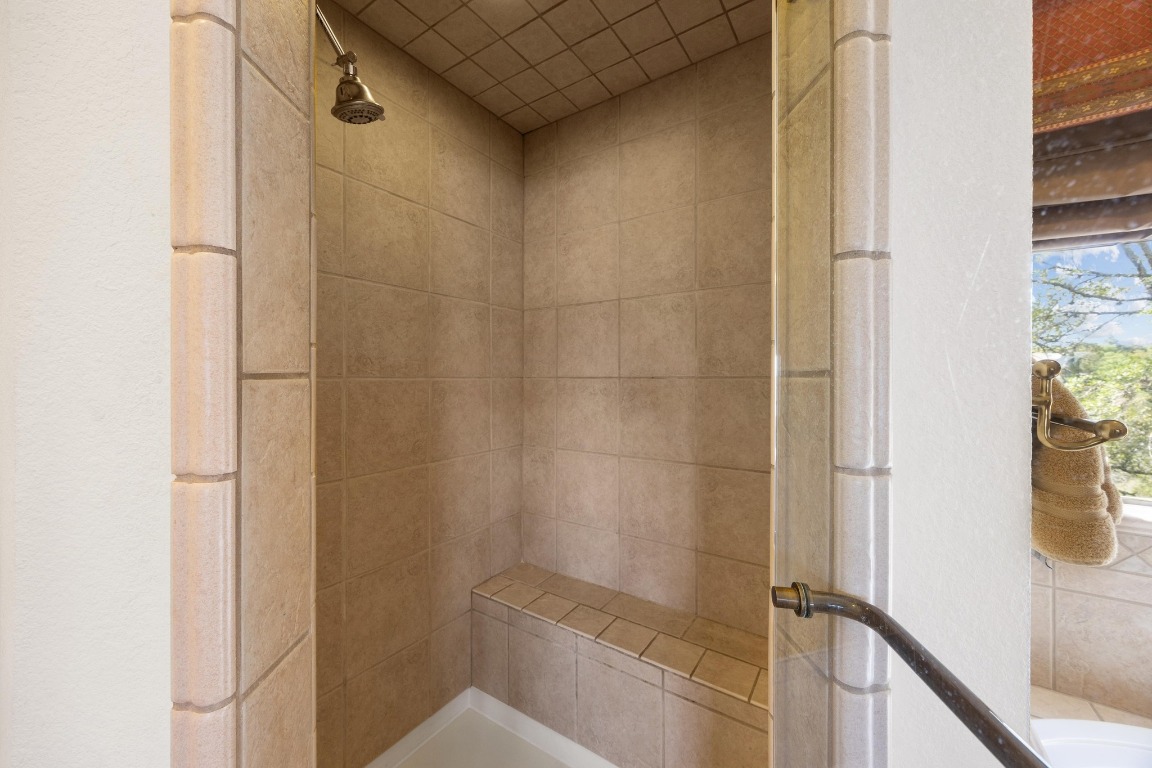 515 Coventry Road Spicewood, TX 78669 - Photo 21 of 36 a bathroom with a shower