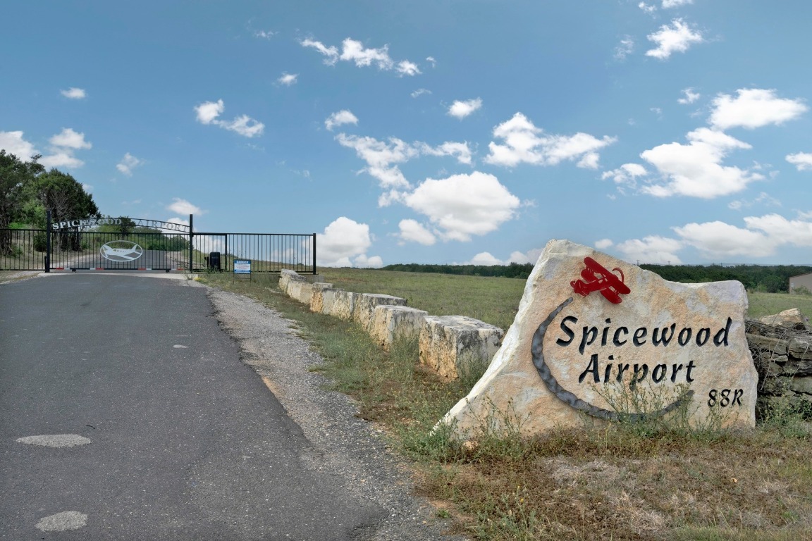 515 Coventry Road Spicewood, TX 78669 - Photo 34 of 36 a view of swimming pool with a yard and sitting area