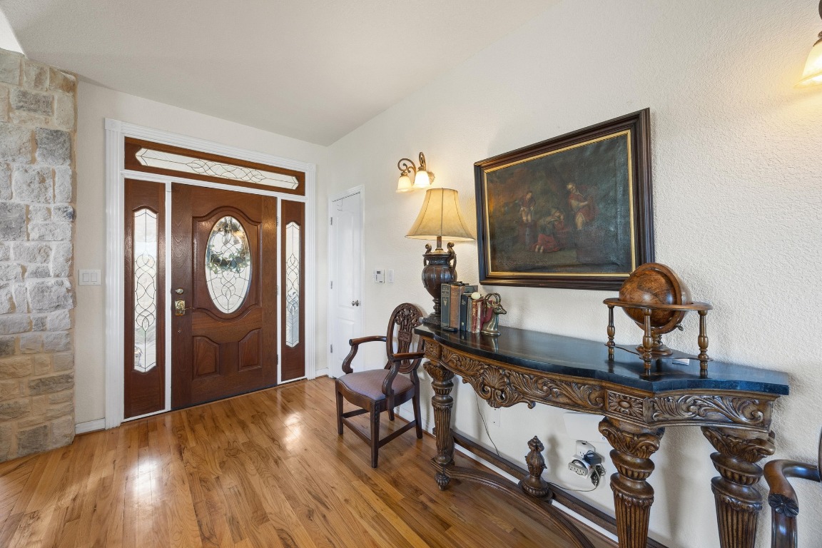 515 Coventry Road Spicewood, TX 78669 - Photo 9 of 36 a living room with furniture and a window