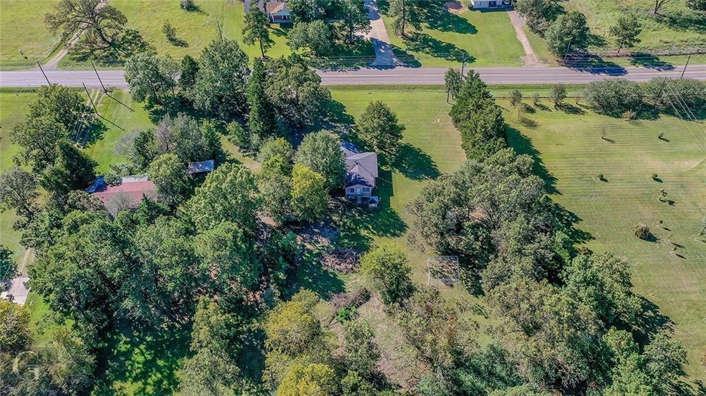7040 Greenwood Road Shreveport, LA 71119 - Photo 11 of 18 an aerial view of residential houses with outdoor space and trees all around