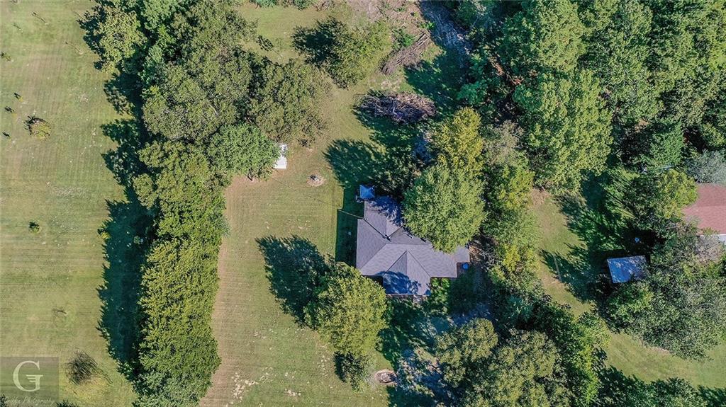 7040 Greenwood Road Shreveport, LA 71119 - Photo 12 of 18 an aerial view of residential house with outdoor space and trees all around