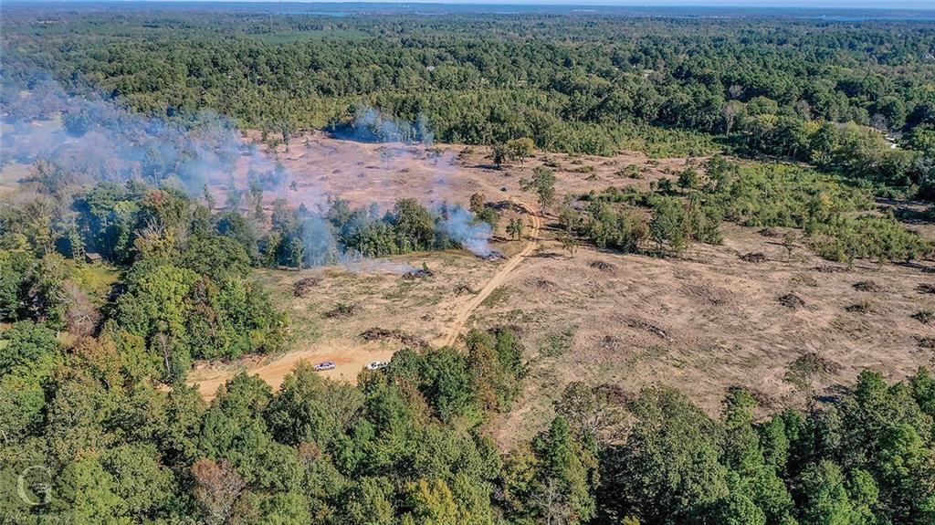 7040 Greenwood Road Shreveport, LA 71119 - Photo 17 of 18 a view of a dry yard with green space