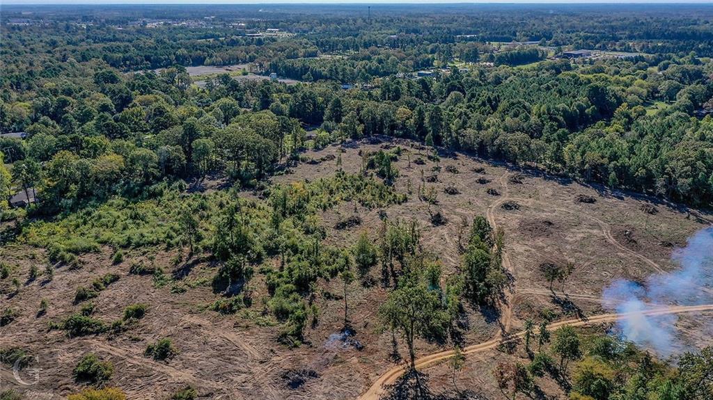 7040 Greenwood Road Shreveport, LA 71119 - Photo 8 of 18 an aerial view of a houses with a yard