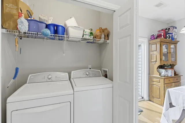 a utility room with dryer and washer