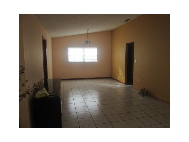 8192 Southwest 90th Avenue Miami, FL 33173 - Photo 3 of 13 a black and white photo of a living room