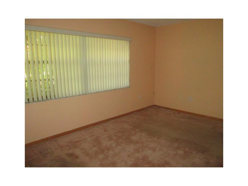 8192 Southwest 90th Avenue Miami, FL 33173 - Photo 8 of 13 a black and white photo of a room