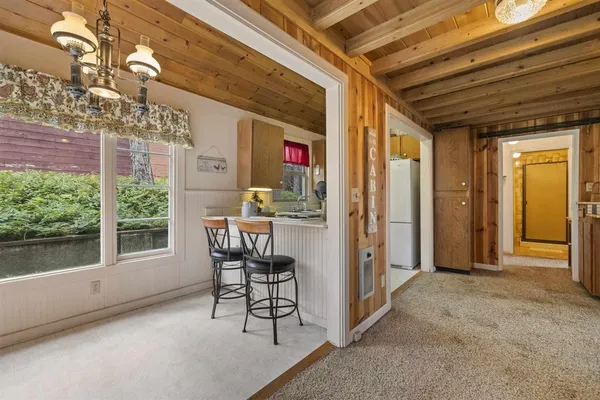 a kitchen with a sink stove and window