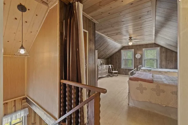 a view of an outdoor dining space with a table and chairs