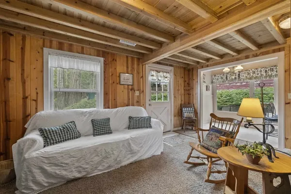 a spacious bedroom with a bed and a table