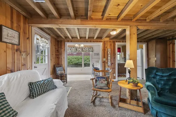 a living room with furniture and a table