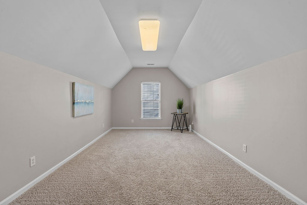 6823 Edwell Court Raleigh, NC 27617 - Photo 20 of 30 Bonus Room with Two Skuttle Storage Spaces