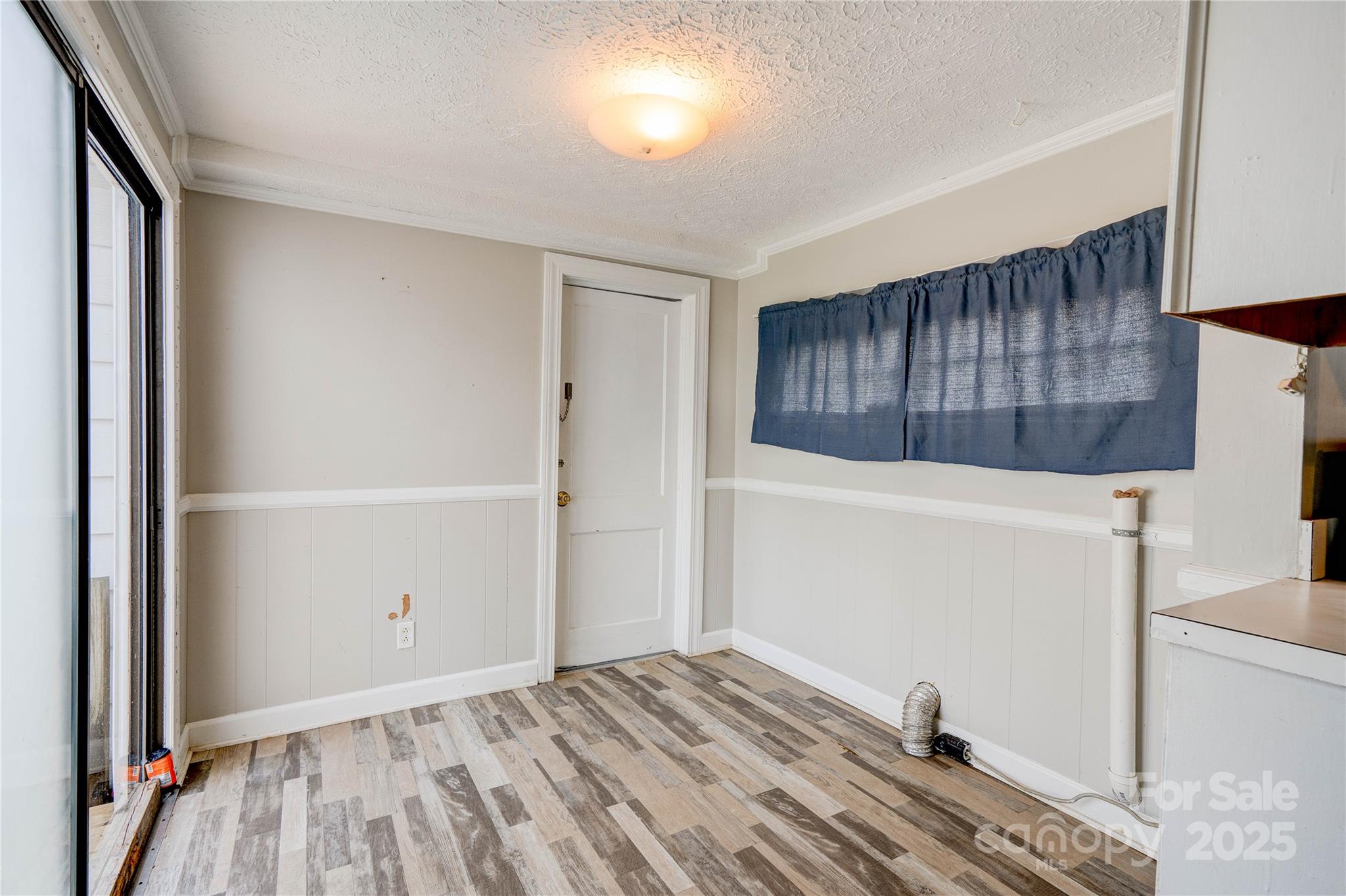 1414 South Post Road Shelby, NC 28152 - Photo 16 of 24 a view of a livingroom with wooden floor