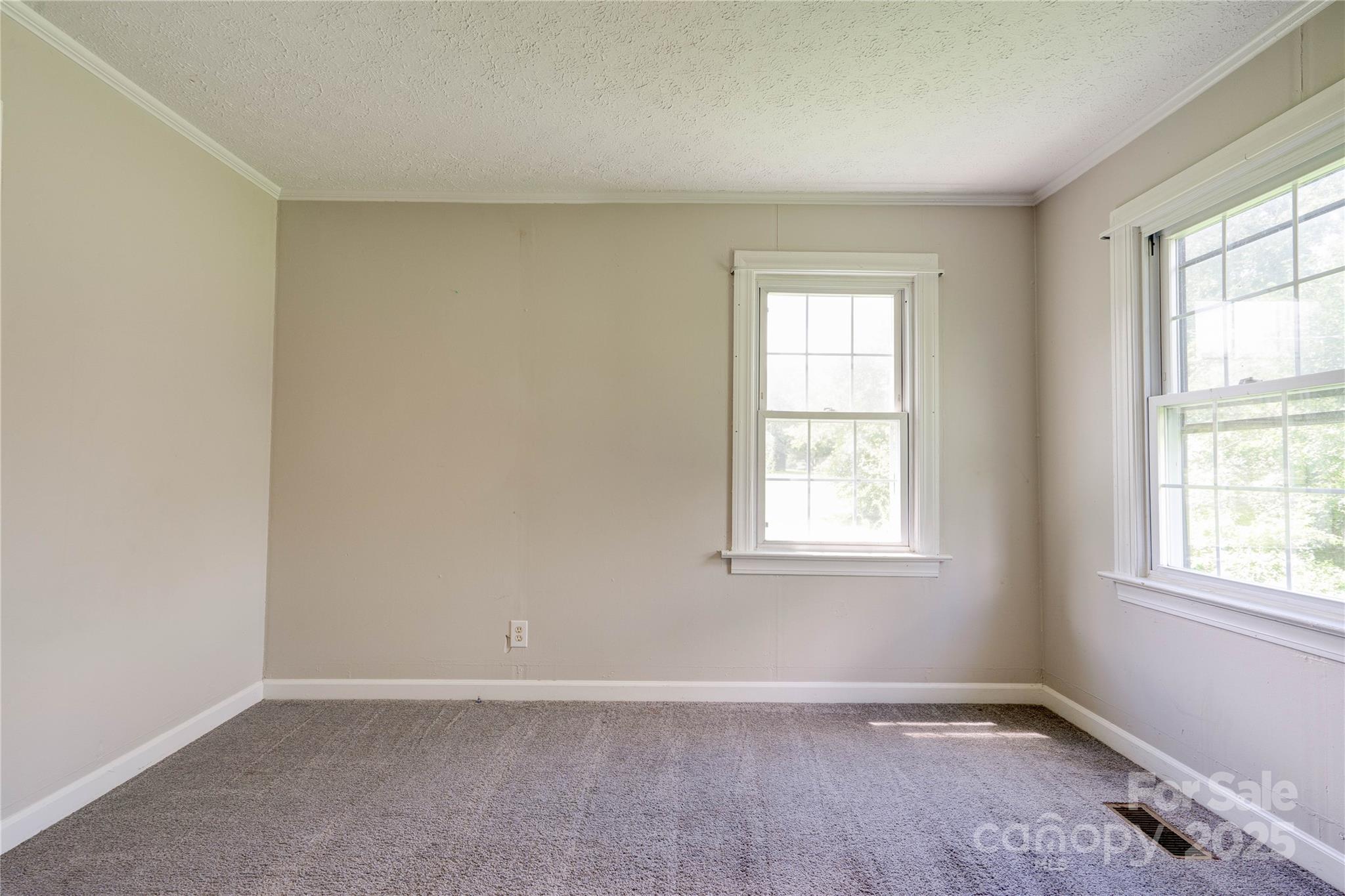 1414 South Post Road Shelby, NC 28152 - Photo 18 of 24 an empty room with windows