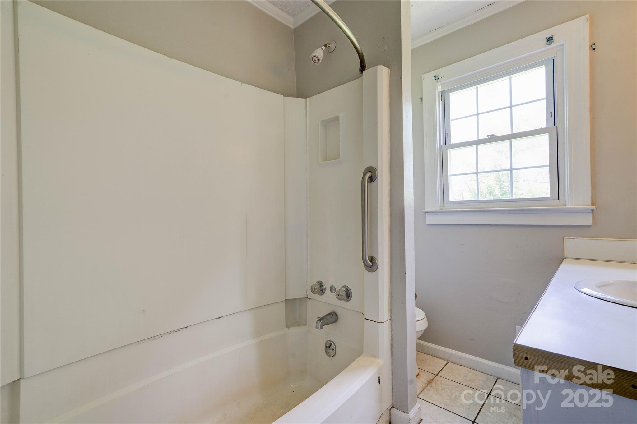 1414 South Post Road Shelby, NC 28152 - Photo 21 of 24 a bathroom with a bathtub