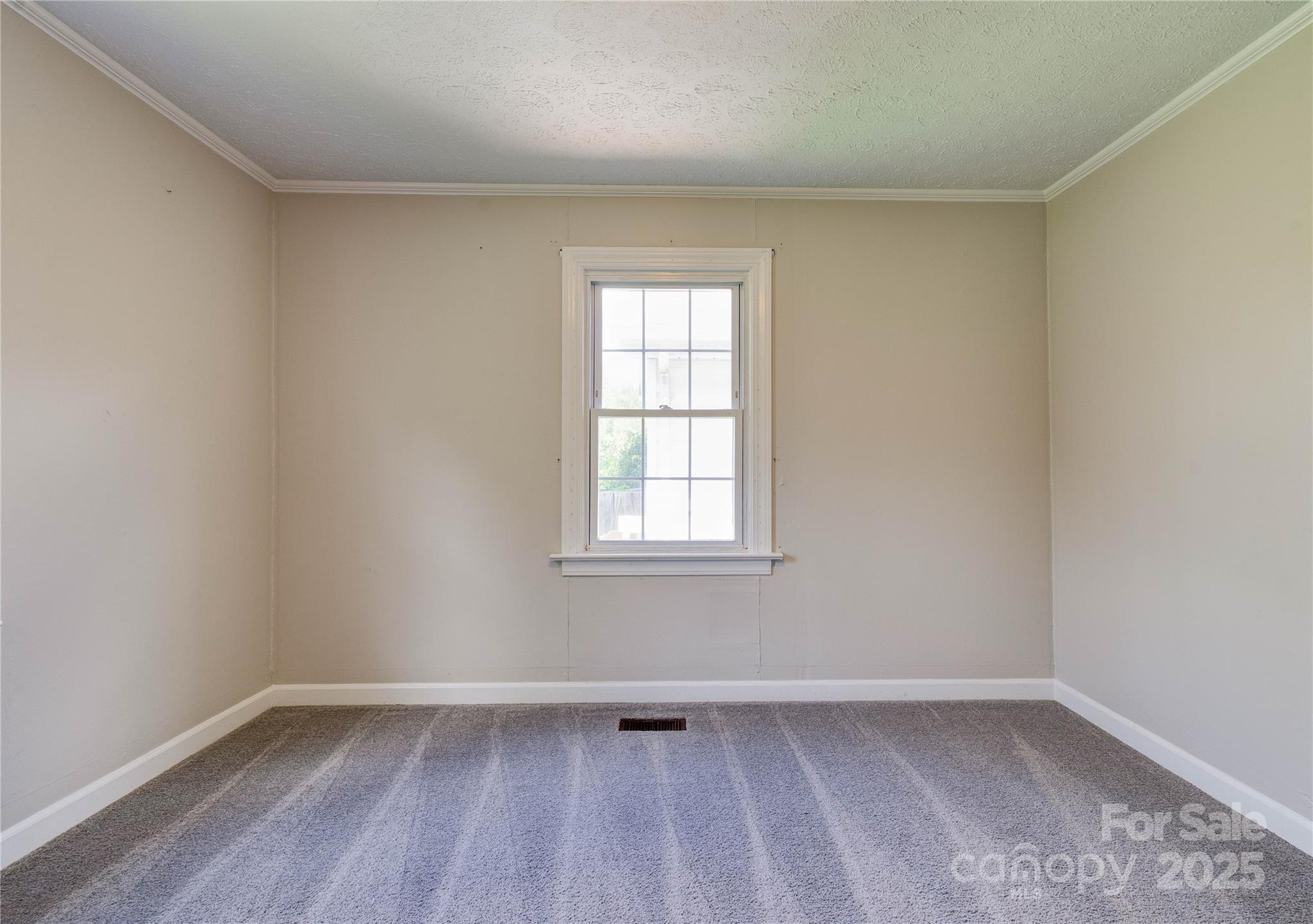 1414 South Post Road Shelby, NC 28152 - Photo 23 of 24 an empty room with a window