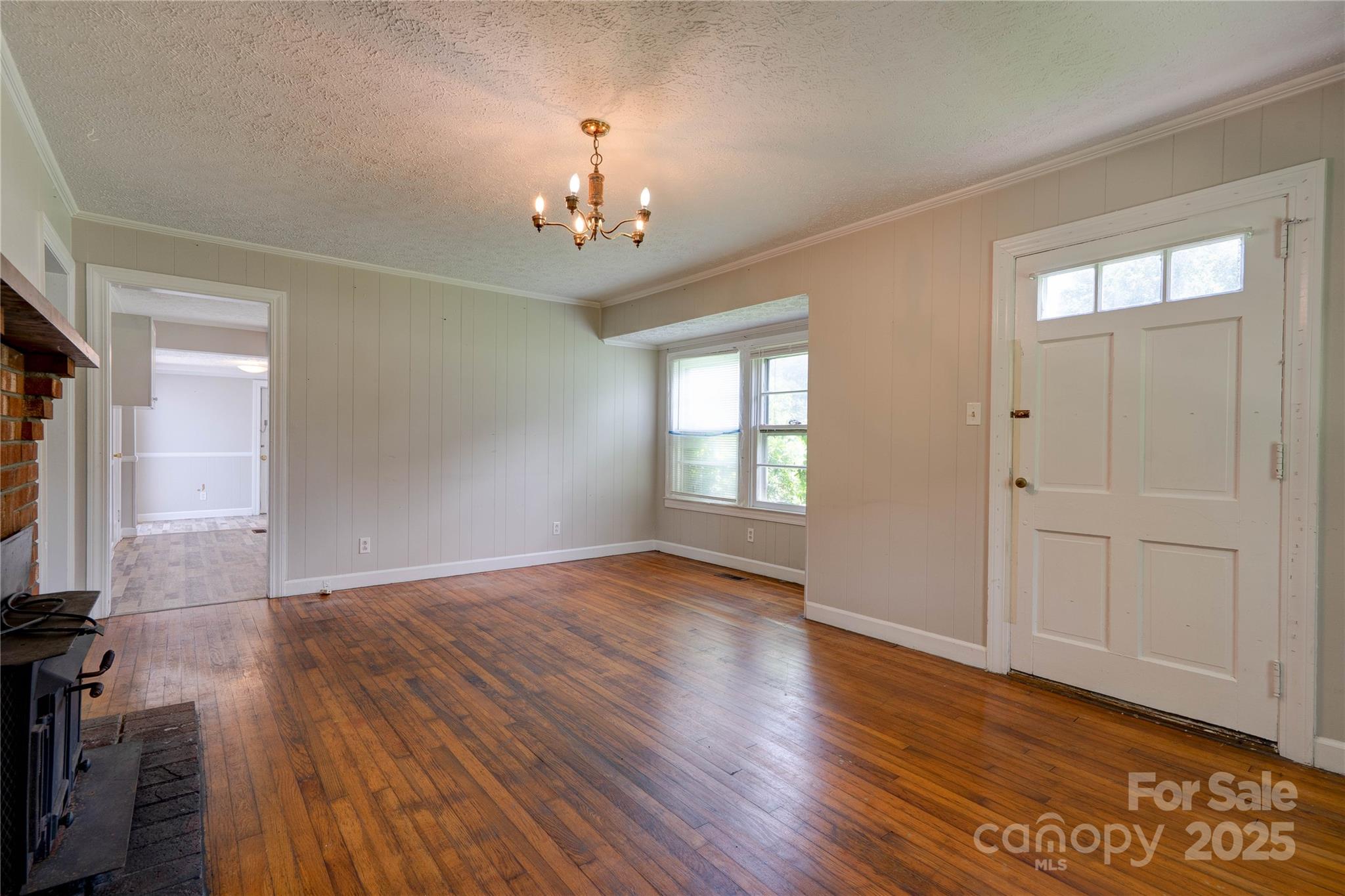 1414 South Post Road Shelby, NC 28152 - Photo 6 of 24 wooden floor in an empty room with a window