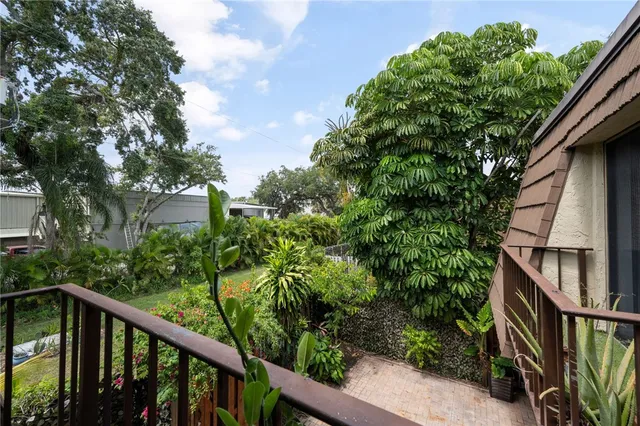 a view of a balcony with an outdoor space
