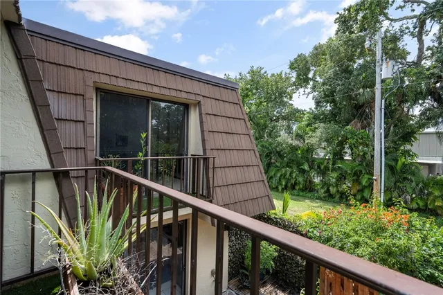 a room with gym equipment and a large window