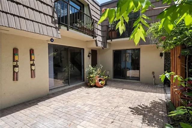 a view of a building with sitting area