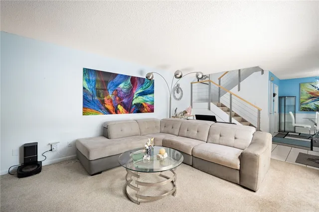 a living room with furniture and a couch