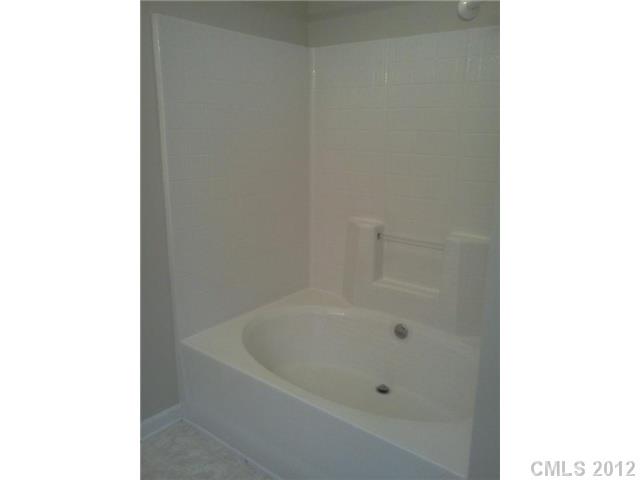 122 Elrosa Road Mooresville, NC 28115 - Photo 12 of 16 a close up of a bathtub
