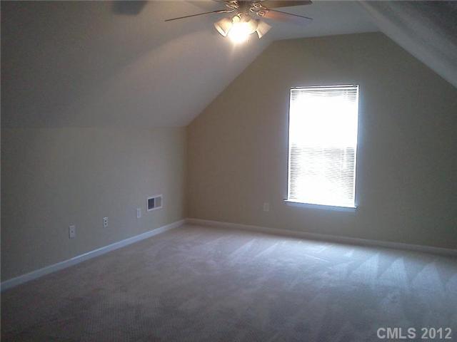 122 Elrosa Road Mooresville, NC 28115 - Photo 16 of 16 an empty room that has a window in it