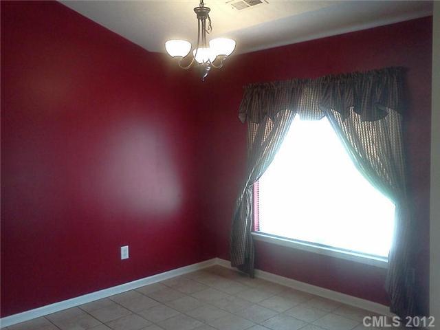 122 Elrosa Road Mooresville, NC 28115 - Photo 8 of 16 an empty room with a window