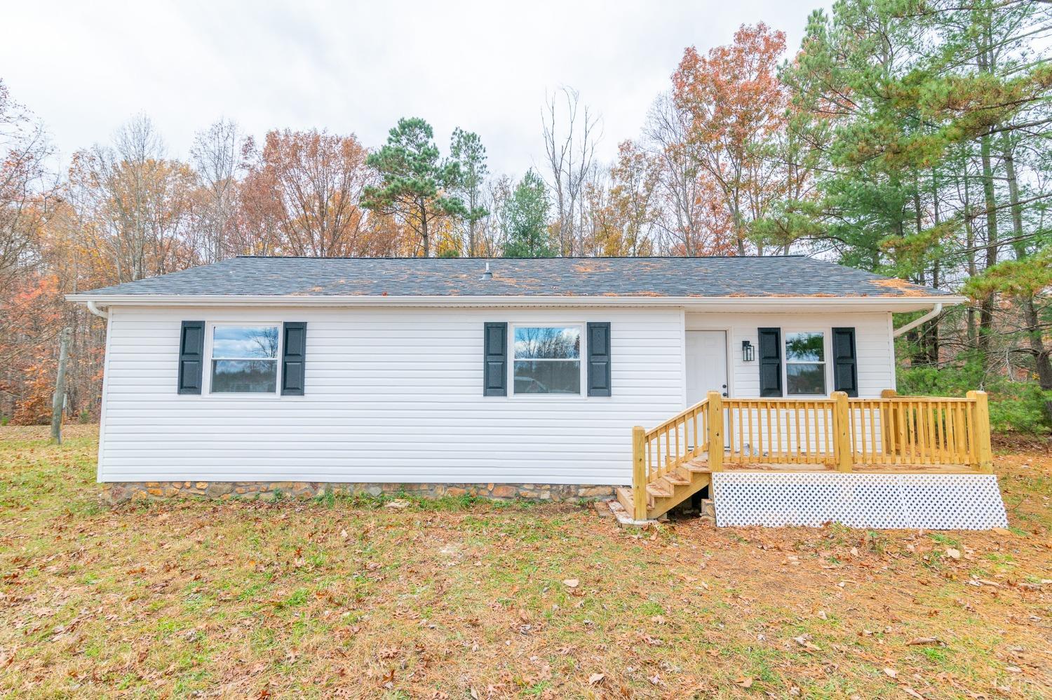 419 Robinson Road Appomattox, VA 24522 - Photo 1 of 19 a view of house with backyard and seating area
