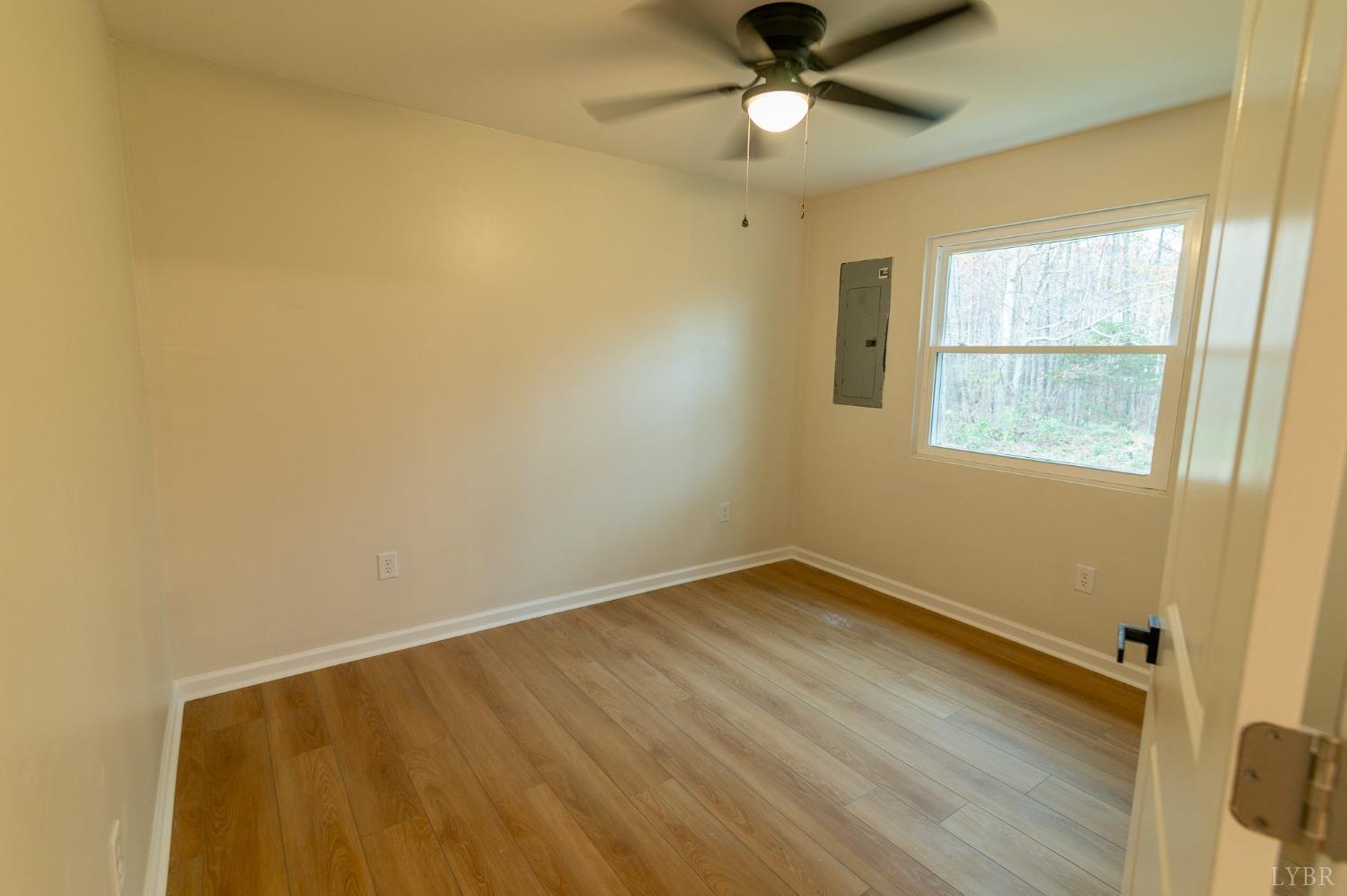 419 Robinson Road Appomattox, VA 24522 - Photo 15 of 19 a view of an empty room with a window