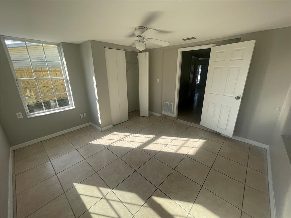 6746 Old Main Street New Port Richey, FL 34653 - Photo 18 of 39 a view of a livingroom with an empty space and a window