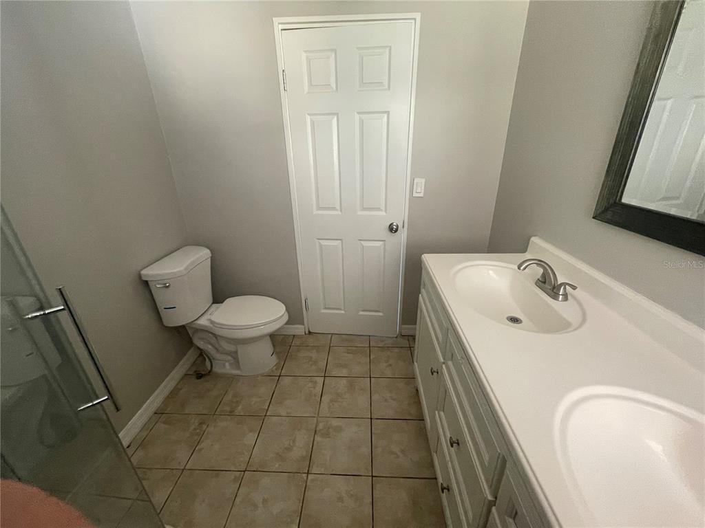 6746 Old Main Street New Port Richey, FL 34653 - Photo 24 of 39 a bathroom with a sink toilet and shower