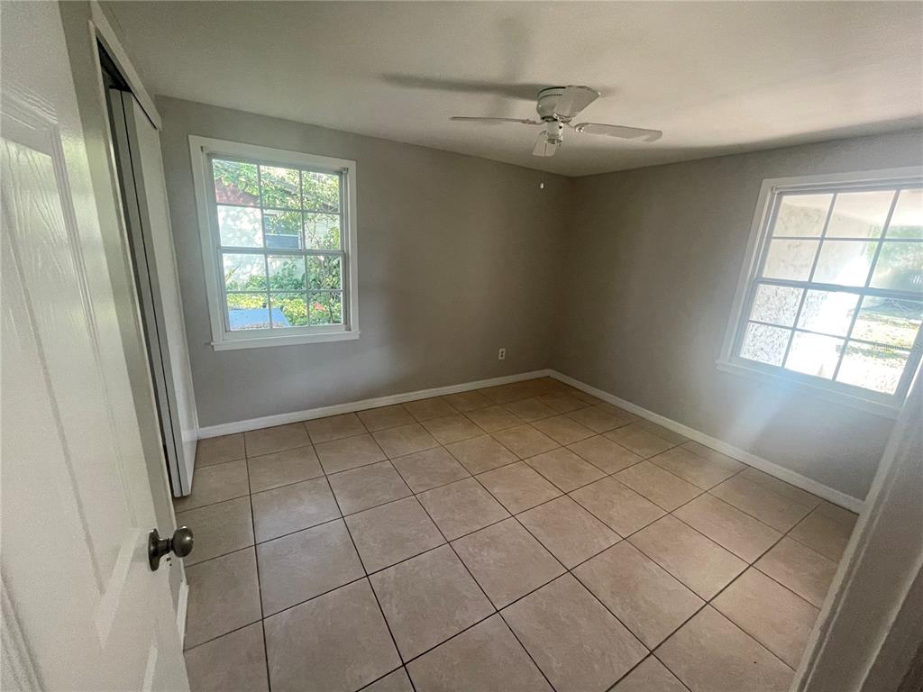 6746 Old Main Street New Port Richey, FL 34653 - Photo 28 of 39 a view of a livingroom with a window and brick walls