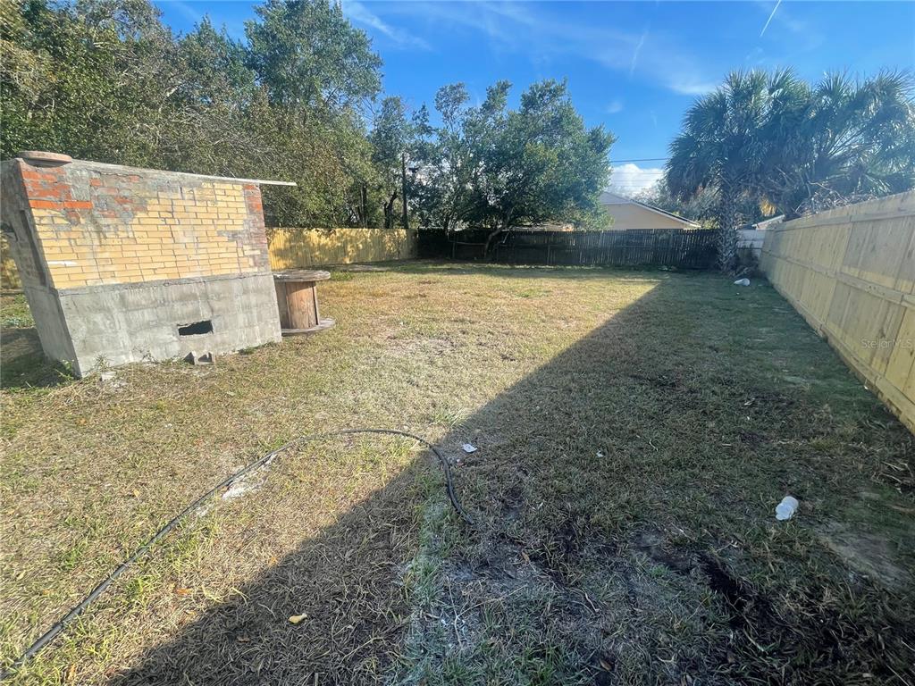 6746 Old Main Street New Port Richey, FL 34653 - Photo 35 of 39 a view of a backyard