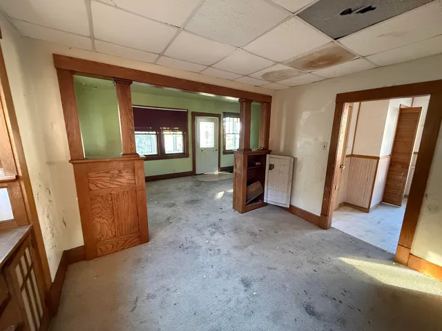 a view of an empty room with a window