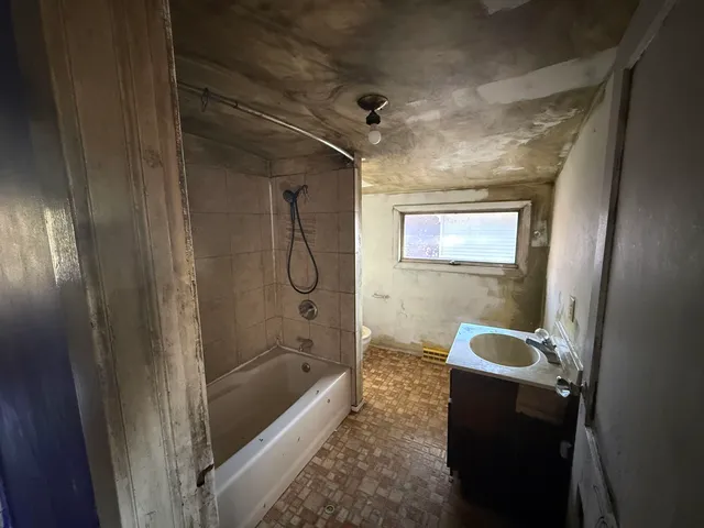 a view of a hallway with parking