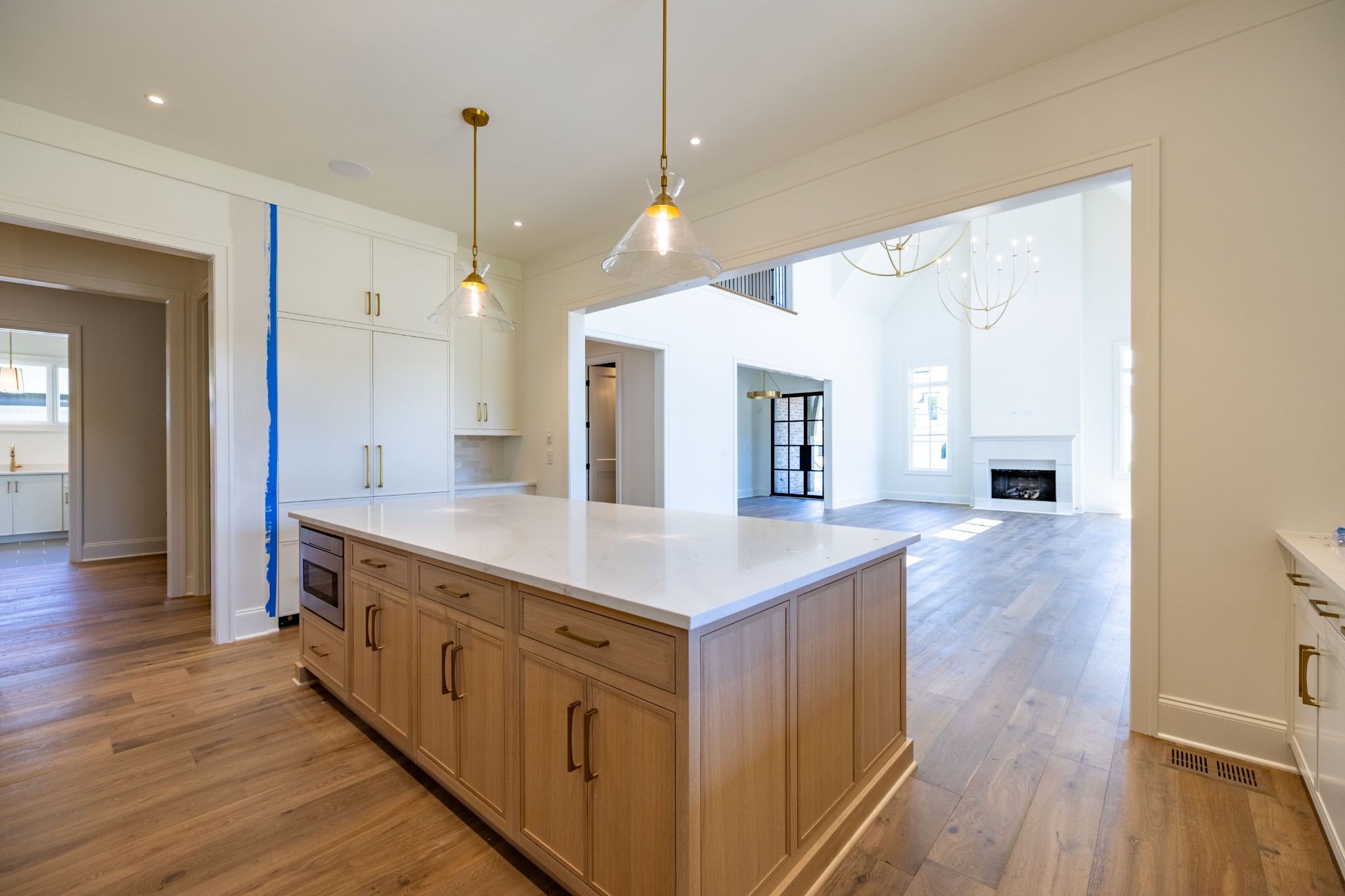 7017 Kinderhook Road Nashville, TN 37221 - Photo 14 of 43 a kitchen with sink stove and wooden floor