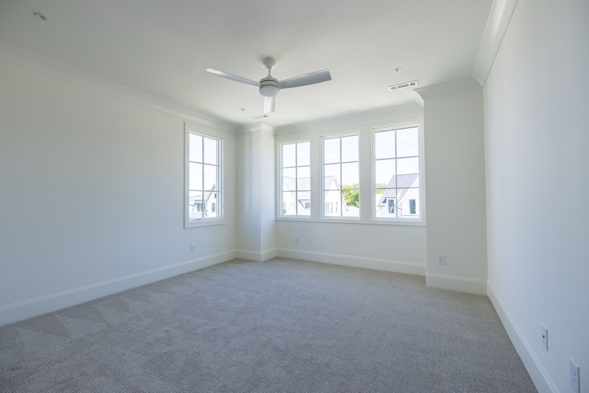 7017 Kinderhook Road Nashville, TN 37221 - Photo 26 of 43 an empty room with a window and a ceiling fan