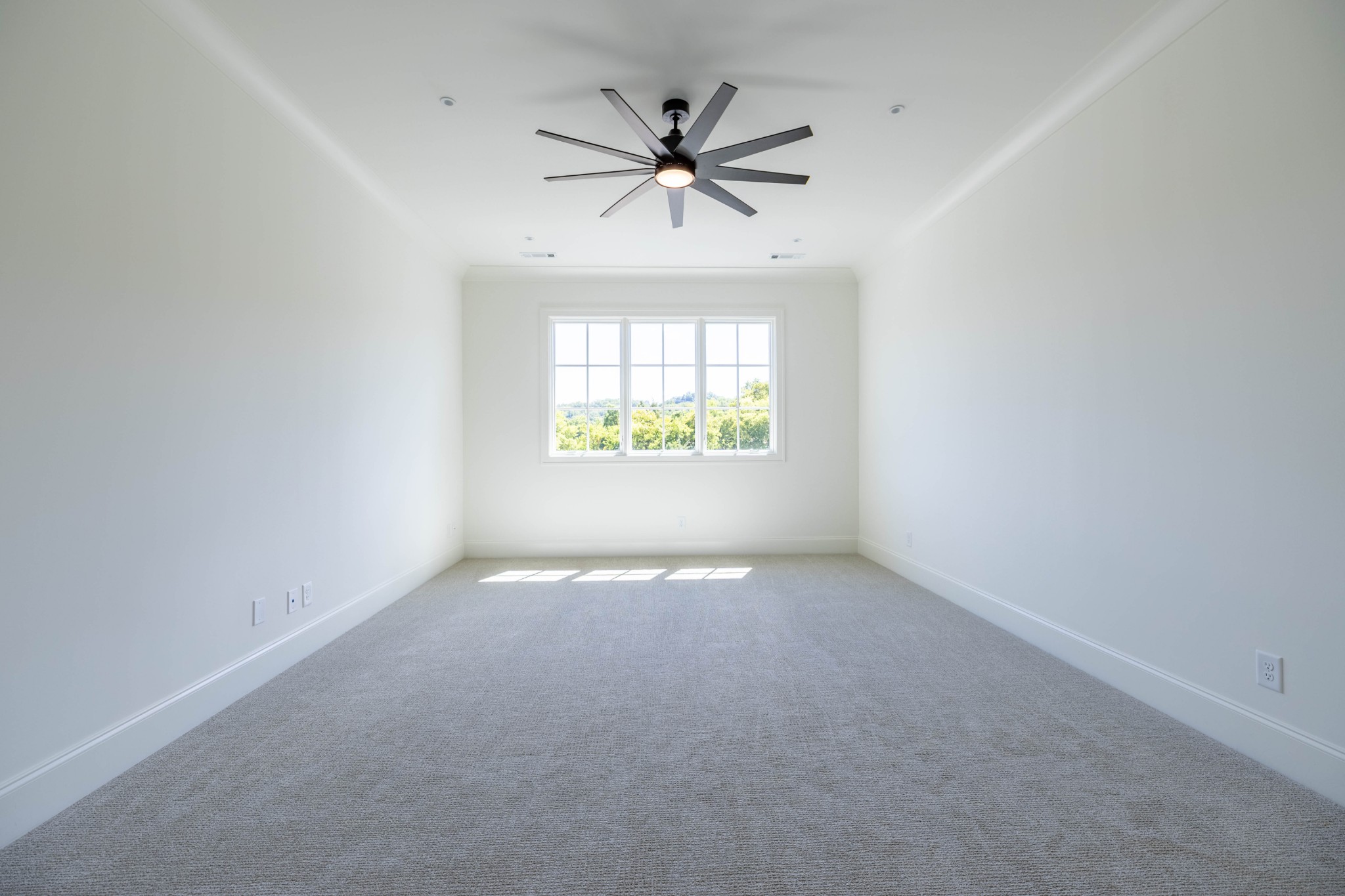 7017 Kinderhook Road Nashville, TN 37221 - Photo 28 of 43 an empty room with windows and fan
