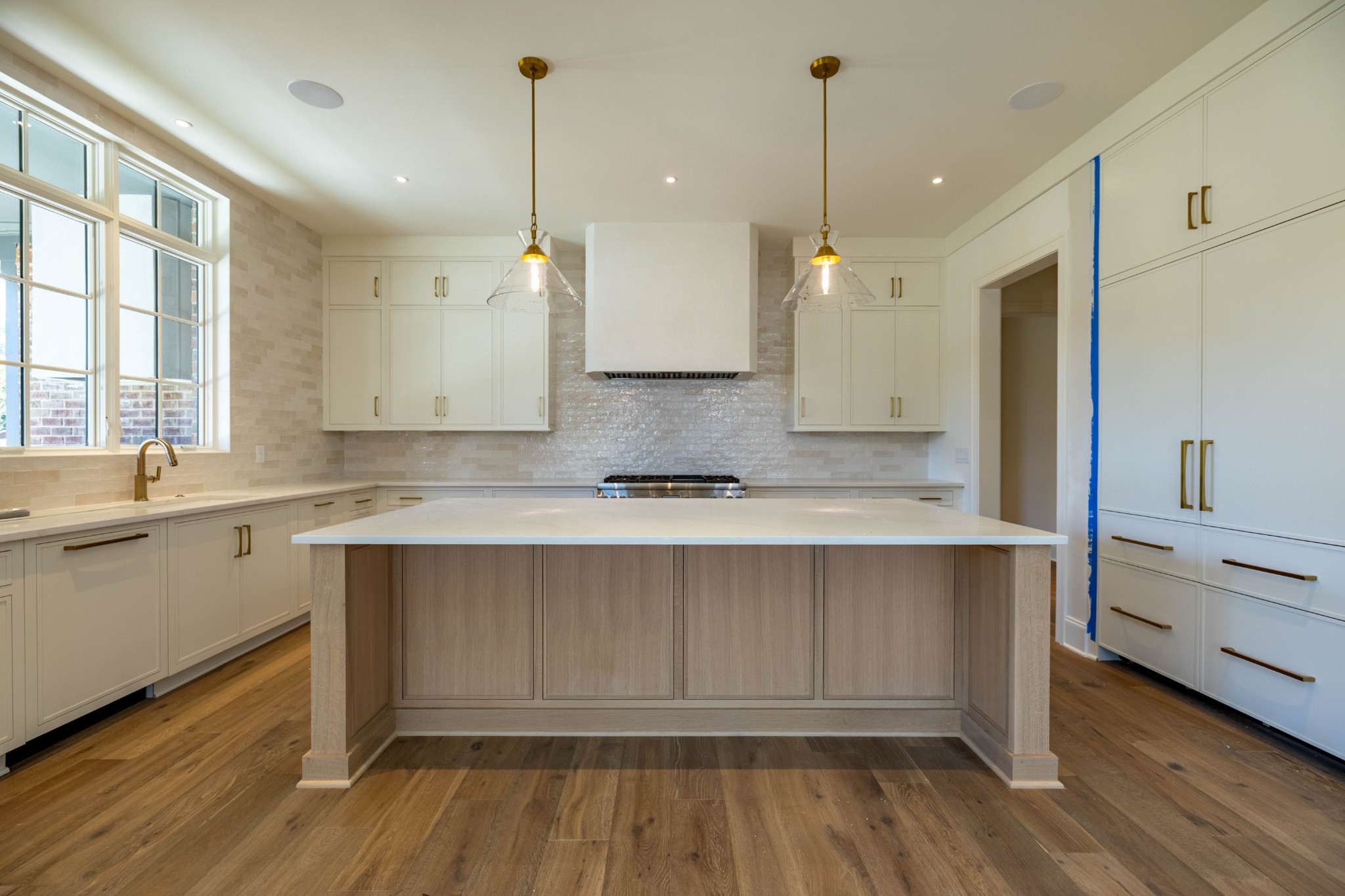 7017 Kinderhook Road Nashville, TN 37221 - Photo 10 of 43 a bathroom with a sink a mirror and a shower