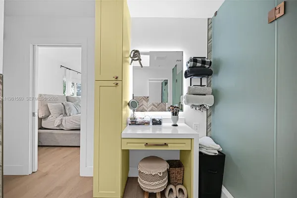 a bedroom with a bed and furniture